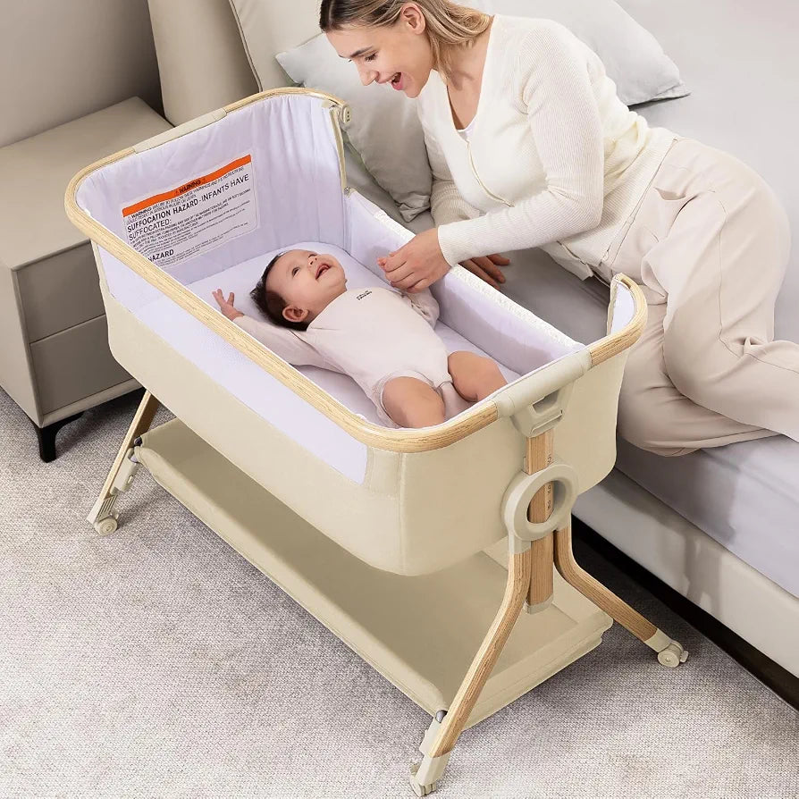 Larex Next To Me Crib，Baby Bassinet Bedside Sleeper Crib Co Sleeper with Mosquito Net, Storage Bag & Basket,Baby Crib with 5-Height Adjustable Levels, Breathable Mattress & Mesh